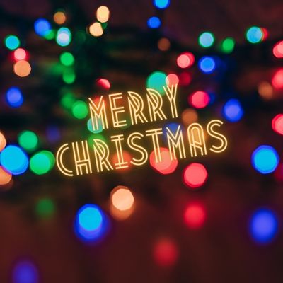 an image with blue, red, and green lights for merry Christmas
