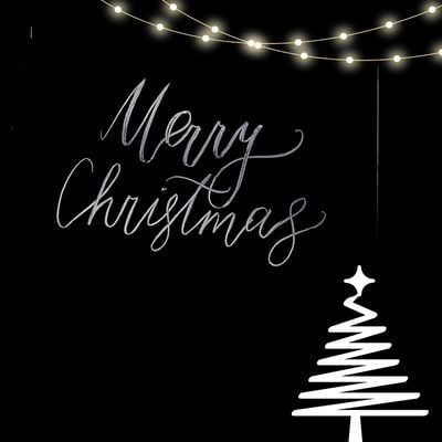 an image with a black background and bright lights for Merry Christmas wishes